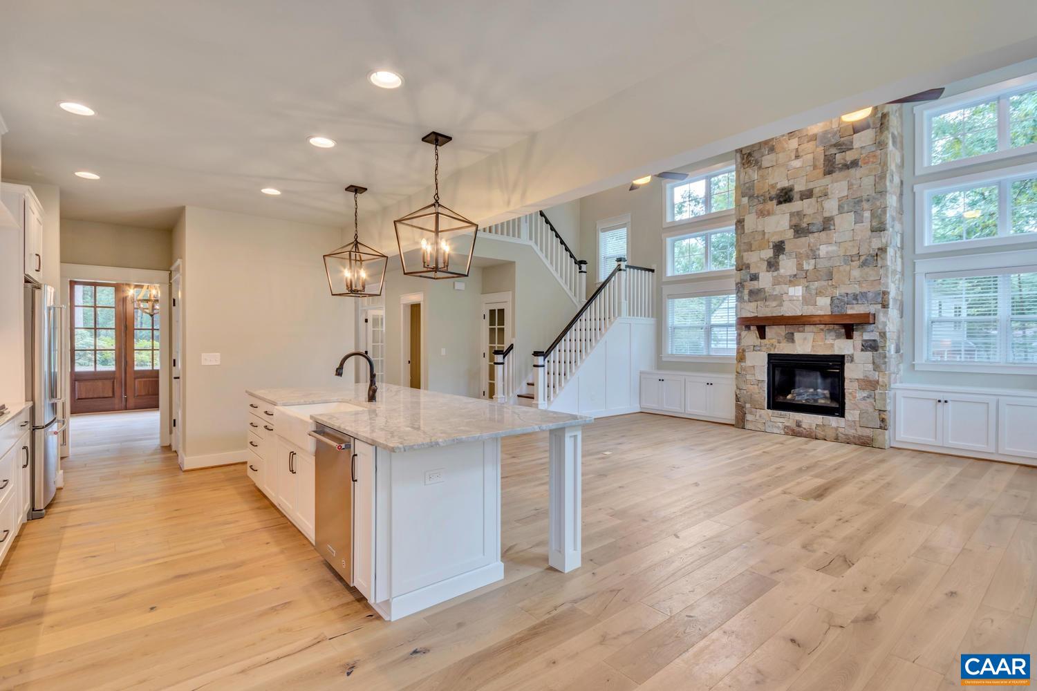 1508 Grove Road Charlottesville, VA 22901 - Photo 13 of 69 a view of living room kitchen with stainless steel appliances granite countertop furniture and a fireplace