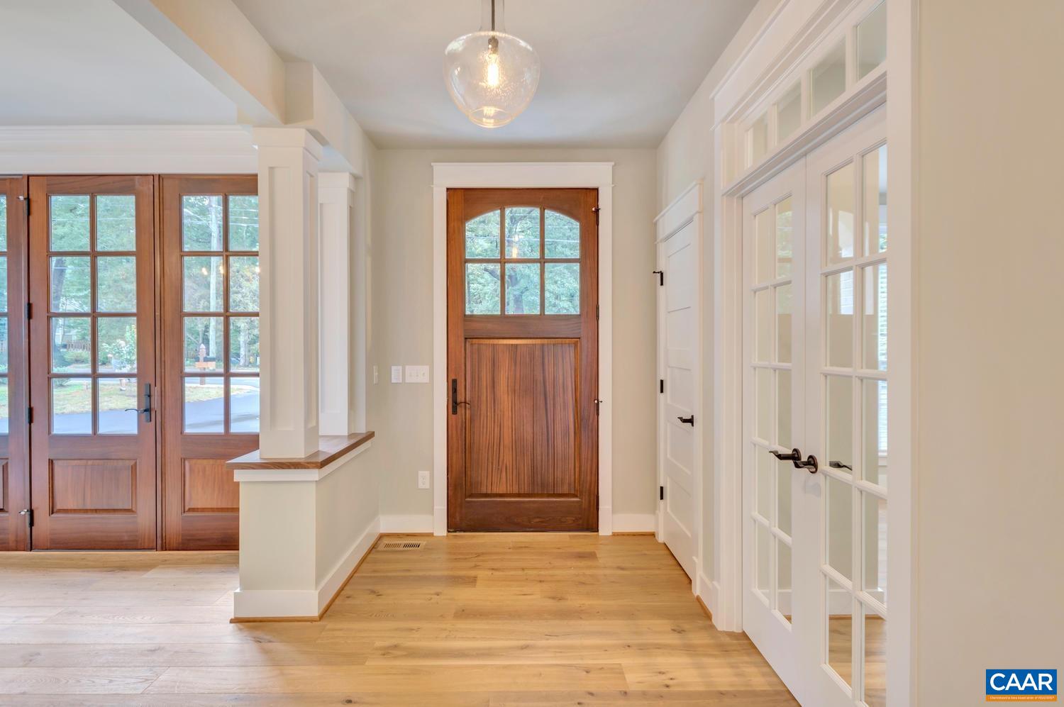 1508 Grove Road Charlottesville, VA 22901 - Photo 4 of 69 an empty room with wooden floor and windows