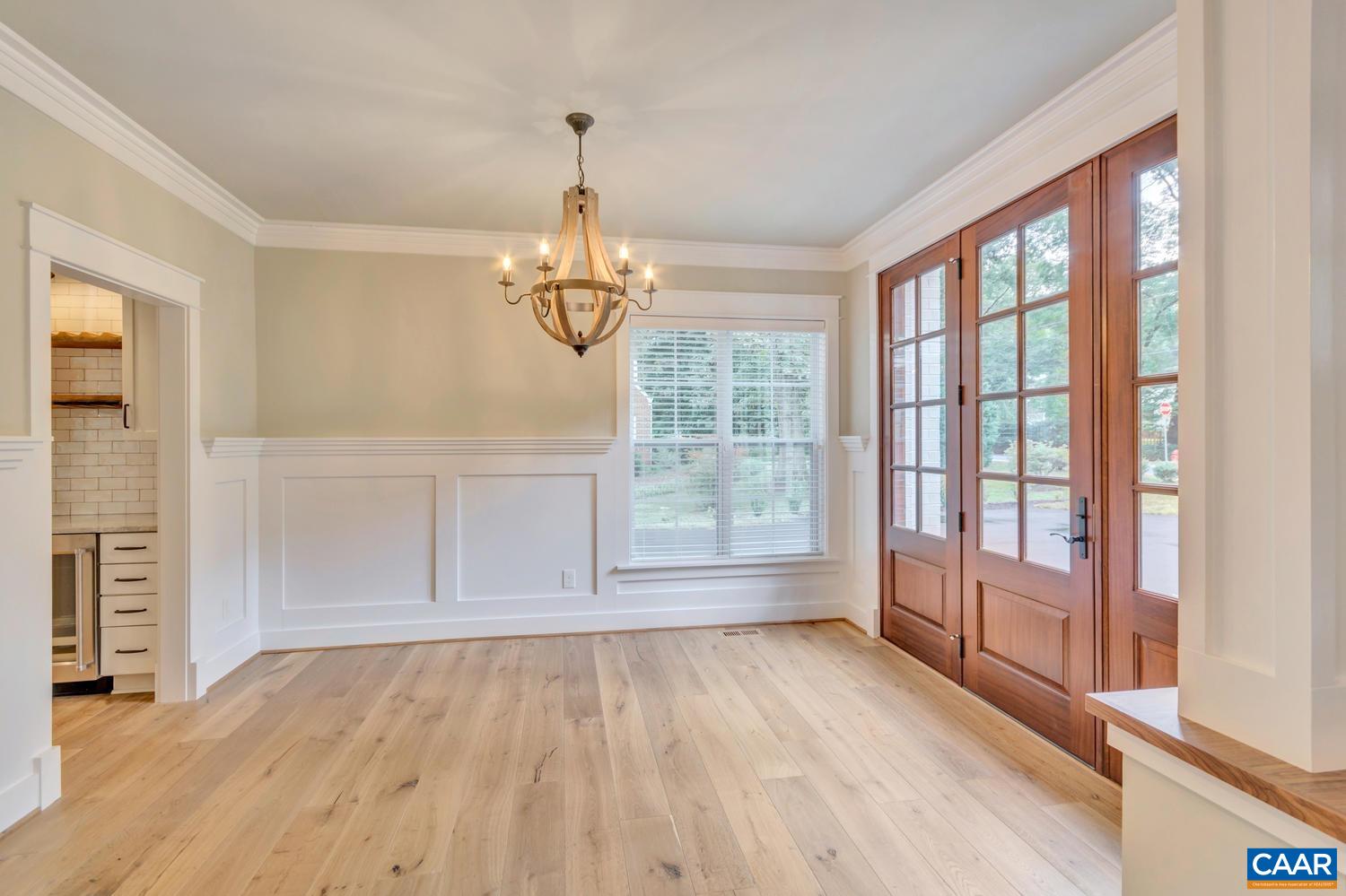 1508 Grove Road Charlottesville, VA 22901 - Photo 5 of 69 a view of empty room with wooden floor and fan