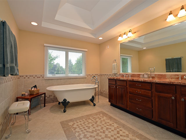 1260 Aberdeen Road Inverness, IL 60067 - Photo 12 of 23 a spacious bathroom with a vanity a sink and a mirror