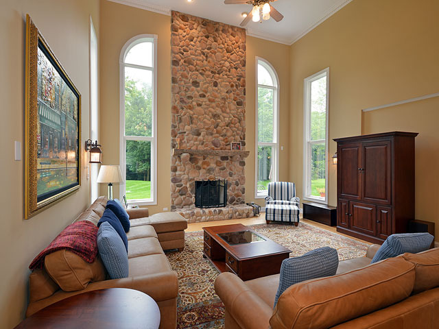 1260 Aberdeen Road Inverness, IL 60067 - Photo 3 of 23 a living room with furniture fireplace and a large window