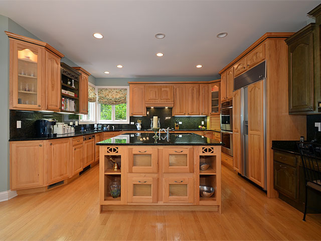 1260 Aberdeen Road Inverness, IL 60067 - Photo 4 of 23 a kitchen with stainless steel appliances granite countertop a refrigerator a stove top oven a sink and dishwasher