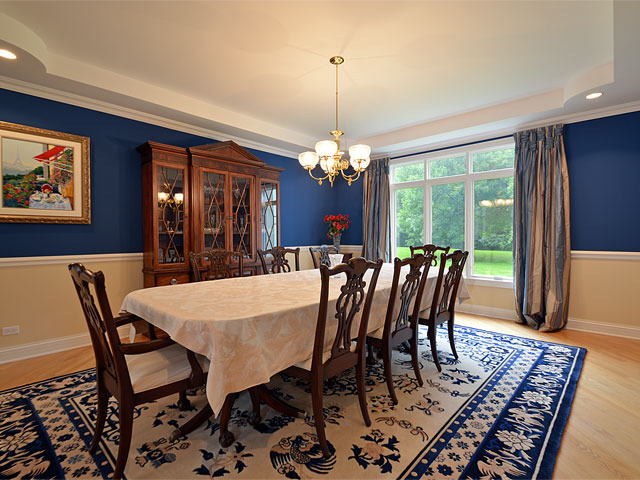 1260 Aberdeen Road Inverness, IL 60067 - Photo 8 of 23 a view of a dining room with furniture window and wooden floor