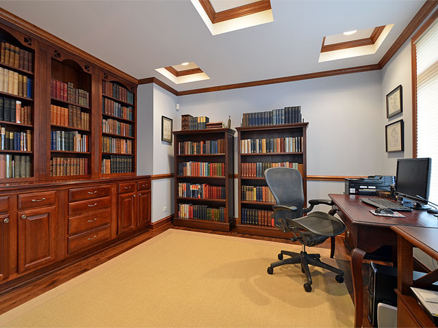 1260 Aberdeen Road Inverness, IL 60067 - Photo 9 of 23 a view of a workspace with bookshelf and a window