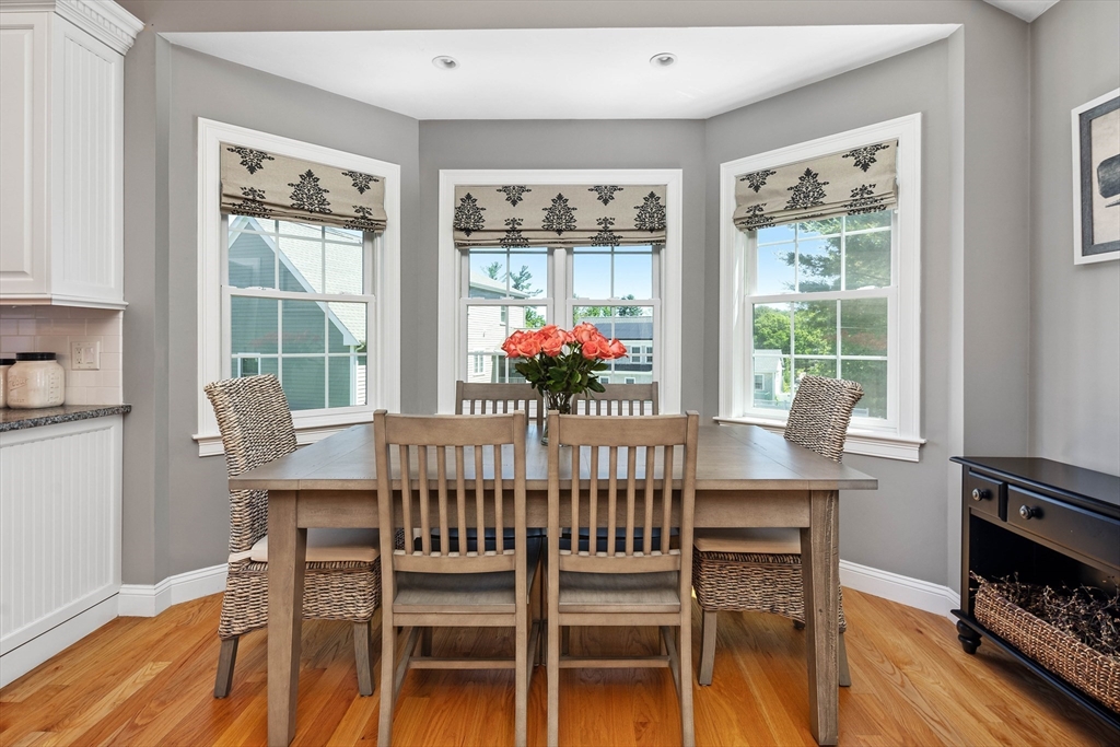 57 Wright's Way Marshfield, MA 02050 - Photo 11 of 35 a view of a dining room with furniture window and wooden floor