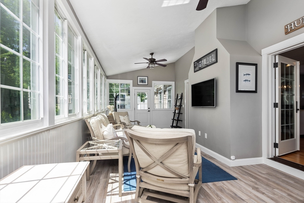 57 Wright's Way Marshfield, MA 02050 - Photo 14 of 35 a living room with a flat screen tv and a window