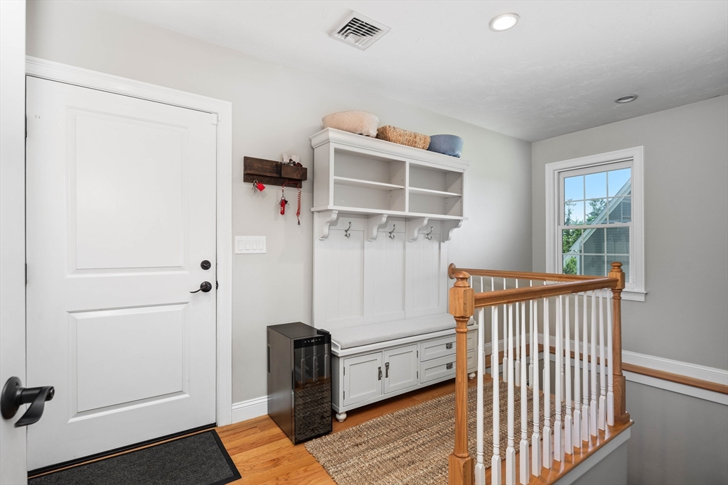 57 Wright's Way Marshfield, MA 02050 - Photo 16 of 35 a view of a livingroom with furniture and staircase