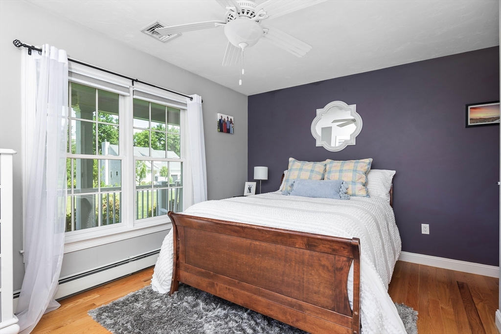 57 Wright's Way Marshfield, MA 02050 - Photo 19 of 35 a bedroom with a bed and a window