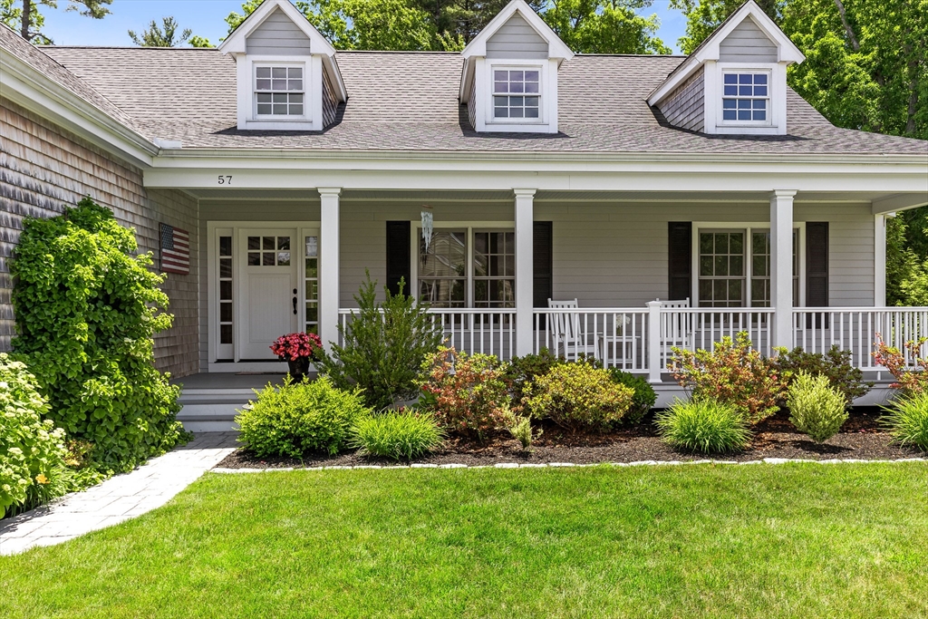 57 Wright's Way Marshfield, MA 02050 - Photo 2 of 35 front view of a house with a yard