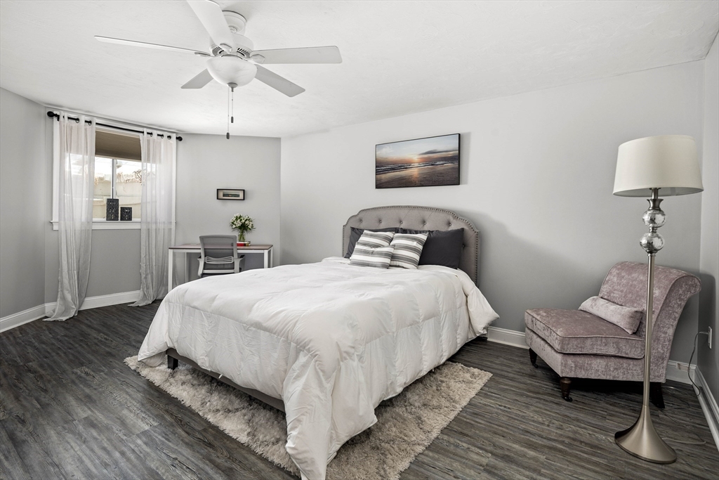 57 Wright's Way Marshfield, MA 02050 - Photo 23 of 35 a bedroom with a bed and wooden floor