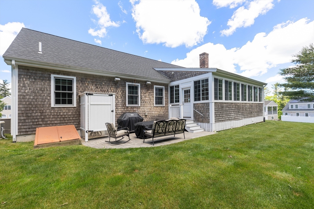 57 Wright's Way Marshfield, MA 02050 - Photo 27 of 35 a view of a house with backyard sitting area and garden