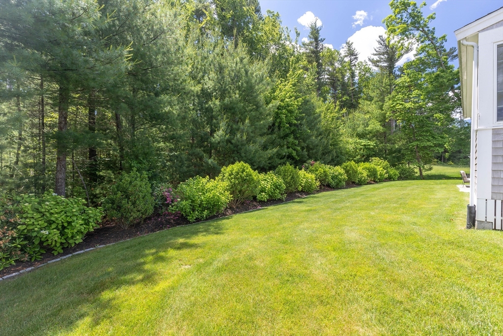 57 Wright's Way Marshfield, MA 02050 - Photo 28 of 35 a view of a yard with a house