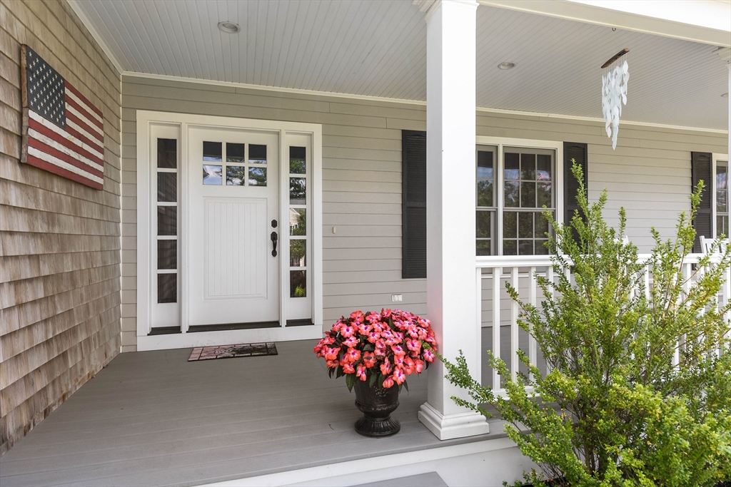 57 Wright's Way Marshfield, MA 02050 - Photo 3 of 35 front view of a house with a potted plant