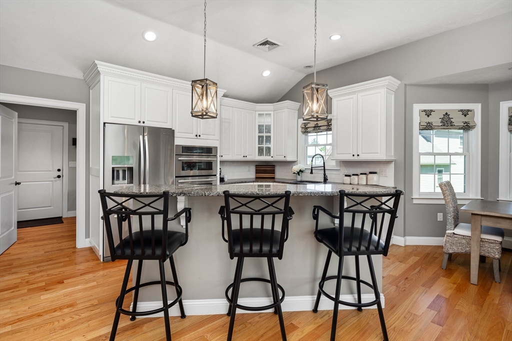 57 Wright's Way Marshfield, MA 02050 - Photo 9 of 35 a view of a dining room with furniture window and wooden floor