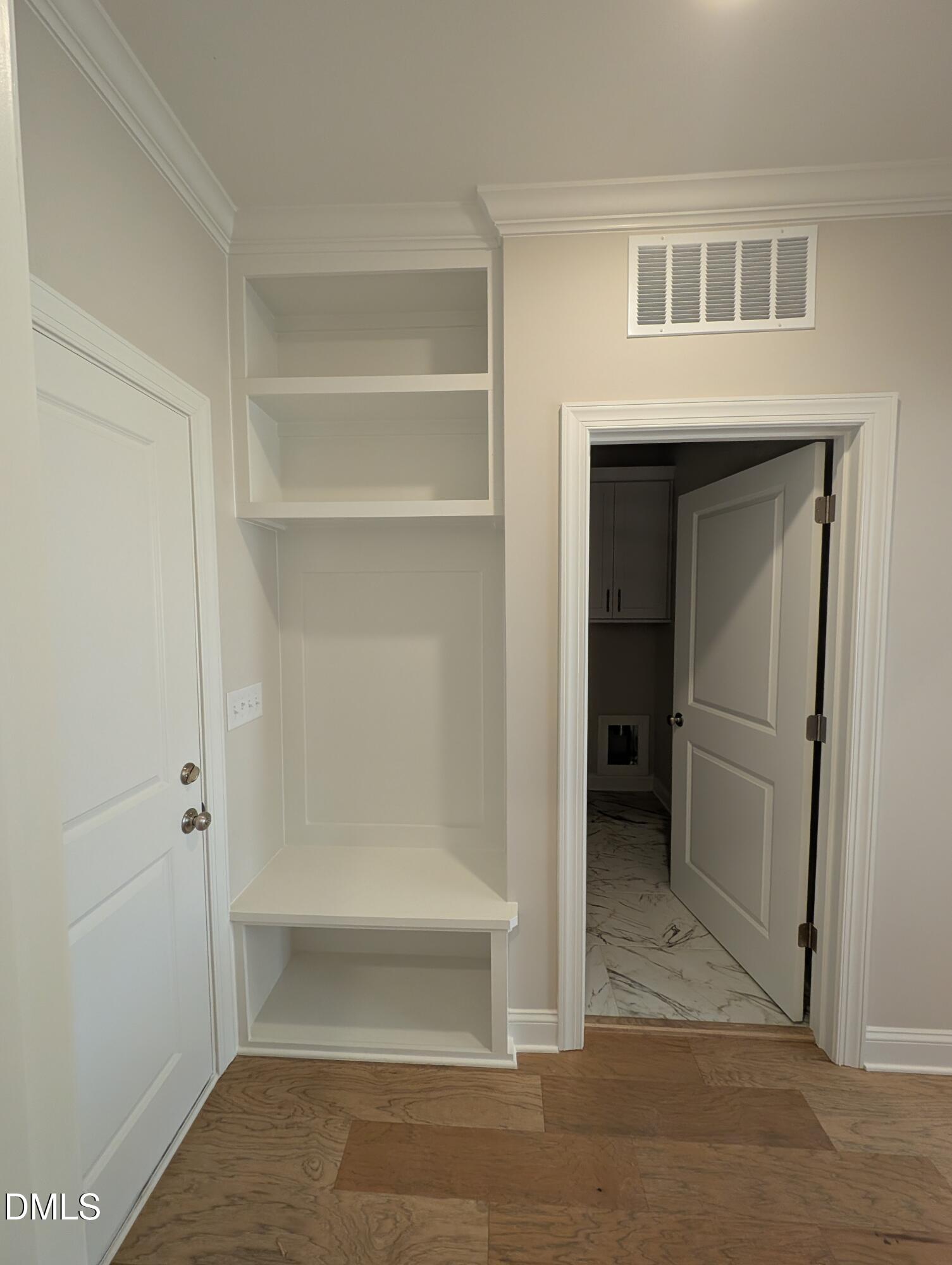 2830 John Lewis Road Burlington, NC 27217 - Photo 17 of 55 a bathroom with a walk in closet and a window