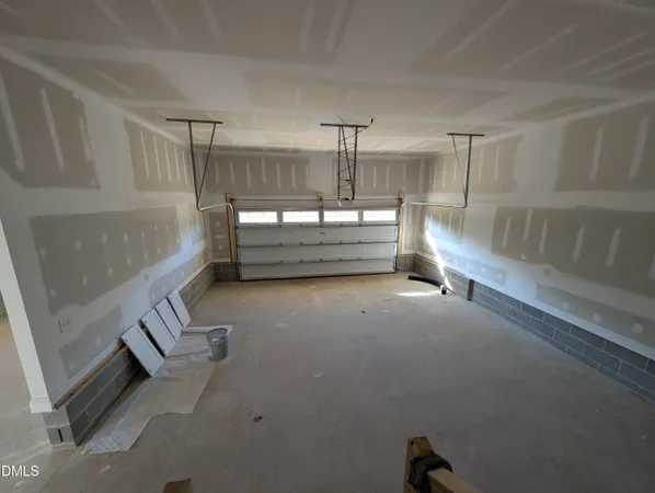 a bathroom with a tub and shower