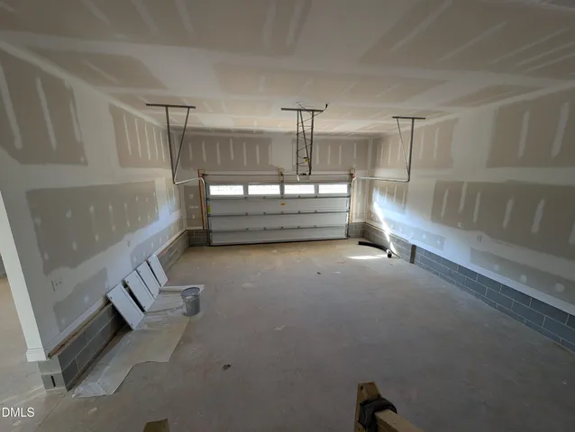 a bathroom with a tub and shower