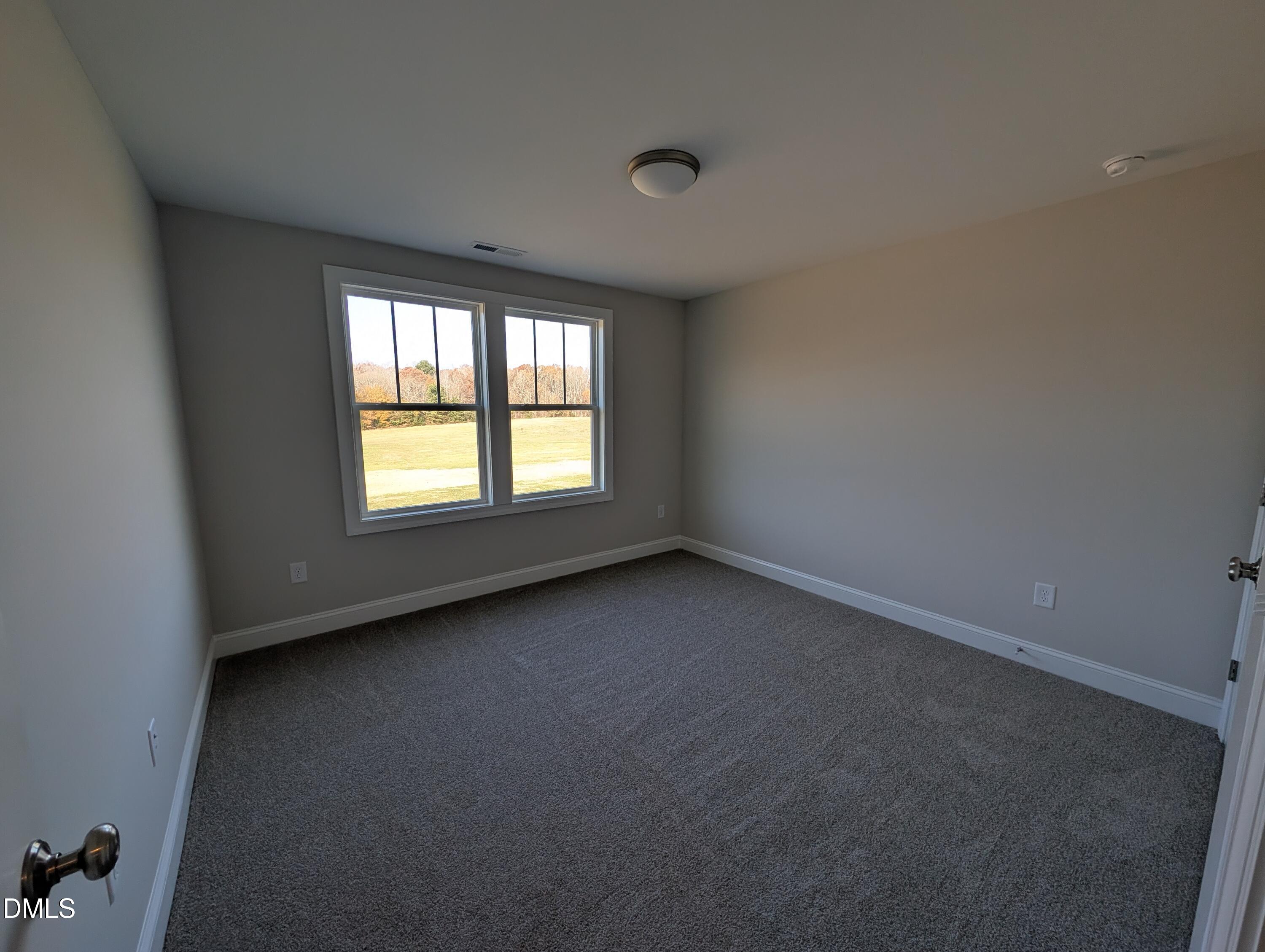 2830 John Lewis Road Burlington, NC 27217 - Photo 43 of 55 an empty room with a window