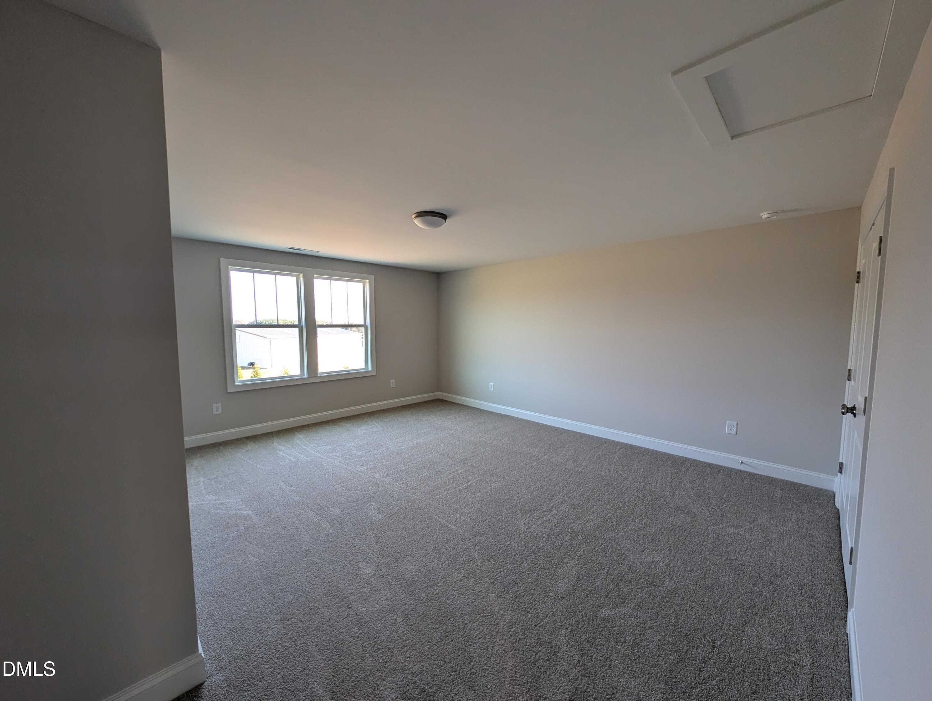 2830 John Lewis Road Burlington, NC 27217 - Photo 45 of 55 an empty room with a window