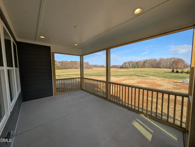 a view of balcony with furniture