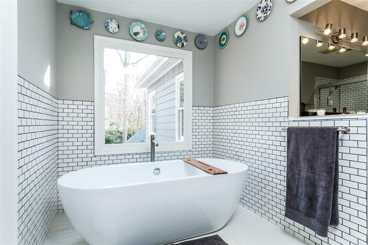 3412 1st Place Raleigh, NC 27613 - Photo 17 of 25 Relax in this amazing stand alone soaking tub!!! Decorative subway tile. Master Spa