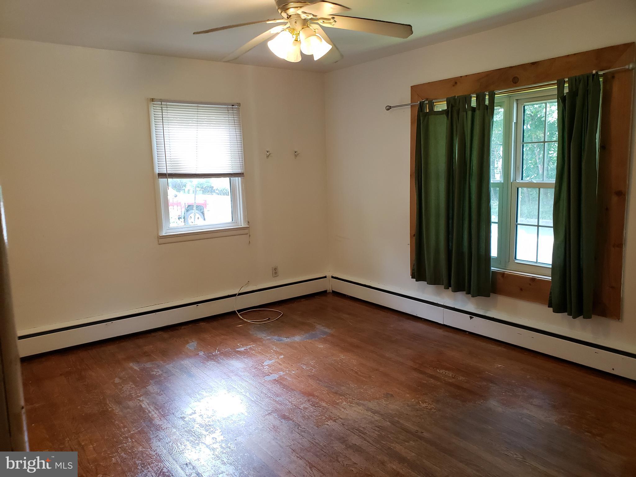 101 Green Lane Trenton, NJ 08638 - Photo 7 of 21 Large Bedroom w hw floors and cedar closet