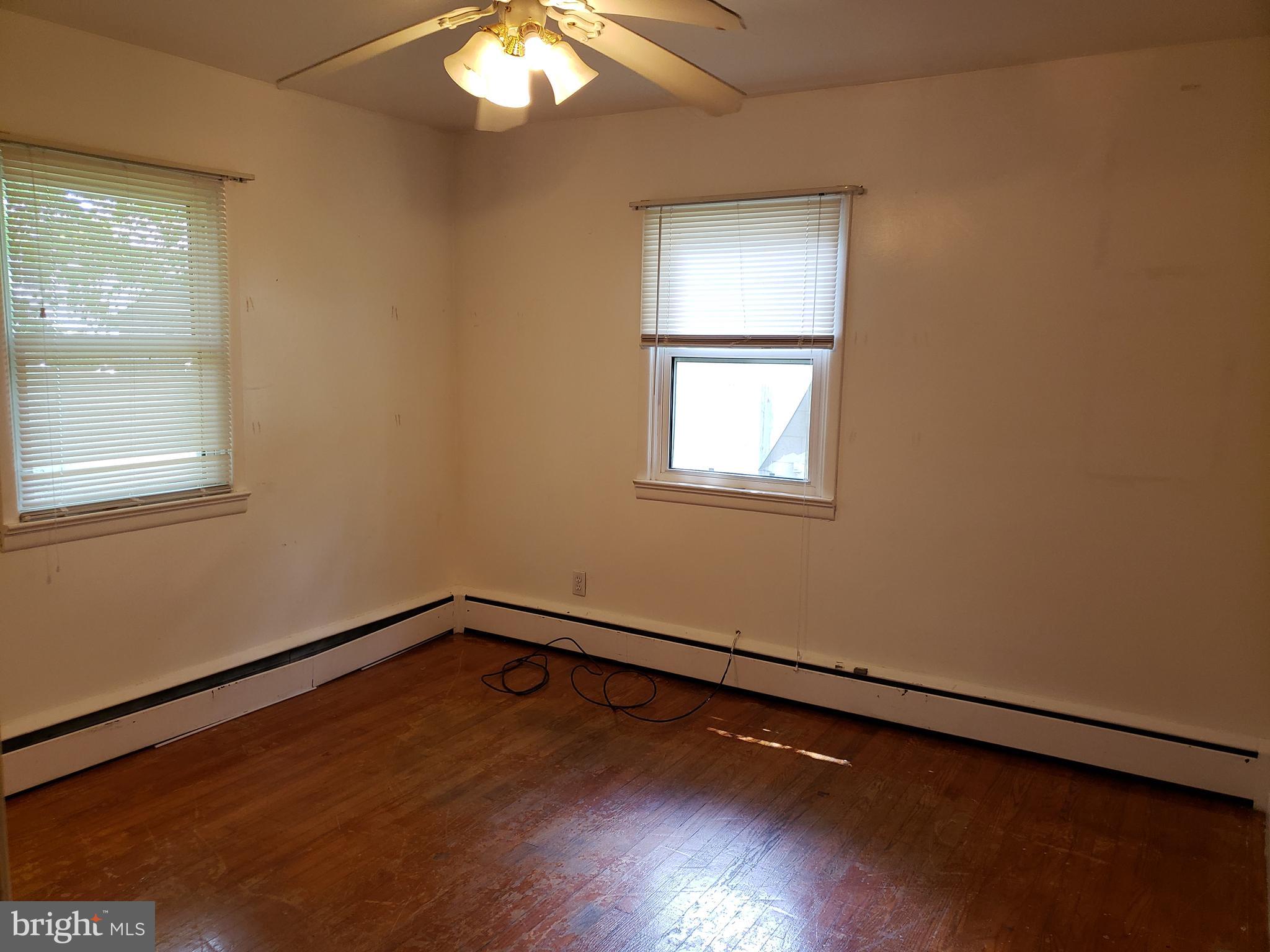 101 Green Lane Trenton, NJ 08638 - Photo 8 of 21 Large Bedroom with hw floors and cedar closet