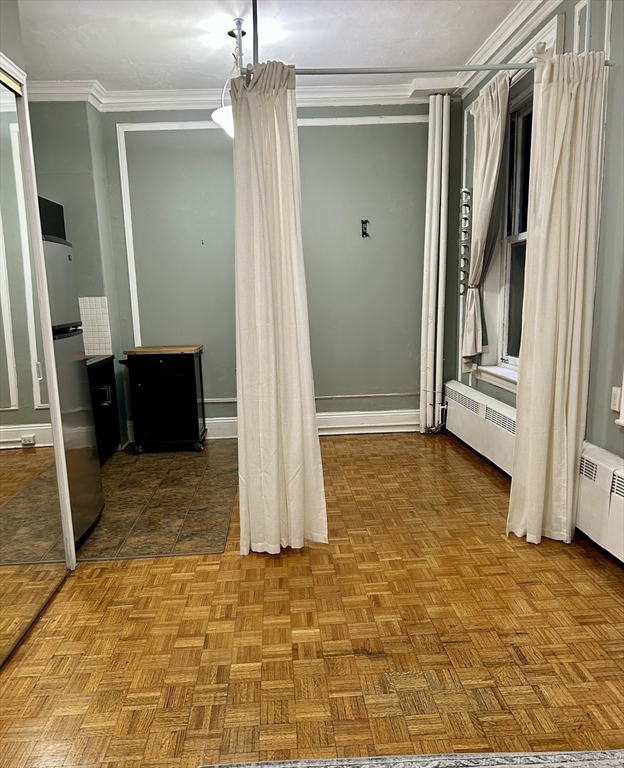 21 Beacon Street, Unit 4Q Boston, MA 02108 - Photo 2 of 10 a view of entryway with wooden floor