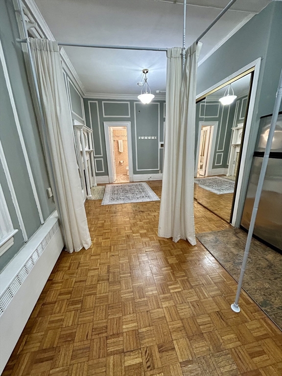 21 Beacon Street, Unit 4Q Boston, MA 02108 - Photo 4 of 10 a view of a hallway