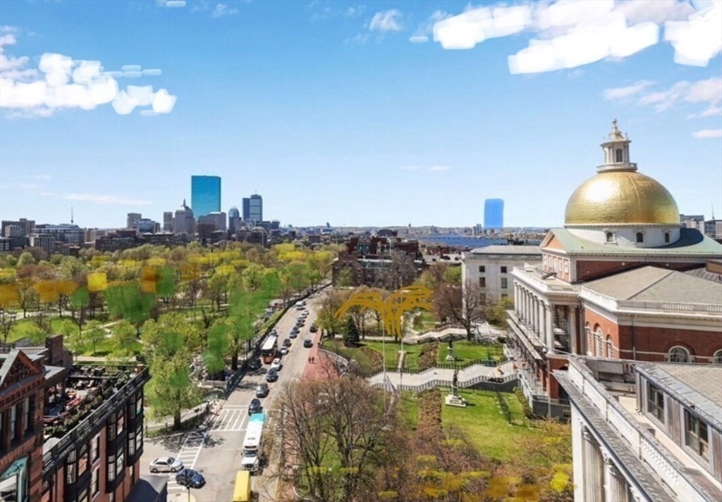21 Beacon Street, Unit 4Q Boston, MA 02108 - Photo 9 of 10 a view of a city with tall buildings
