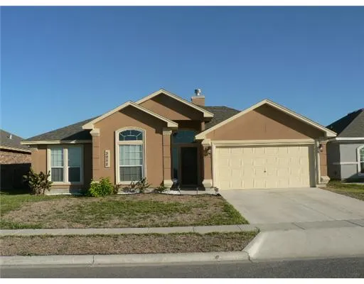 a view of a front of house with garage