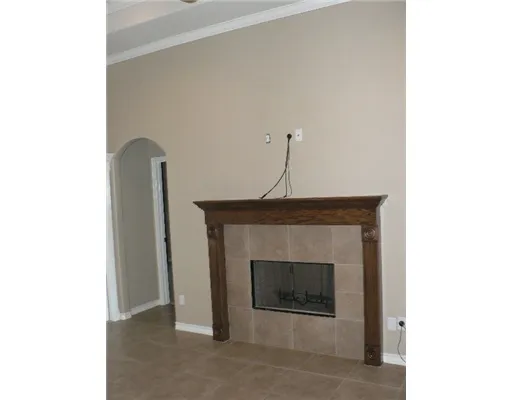 a living room with a fireplace