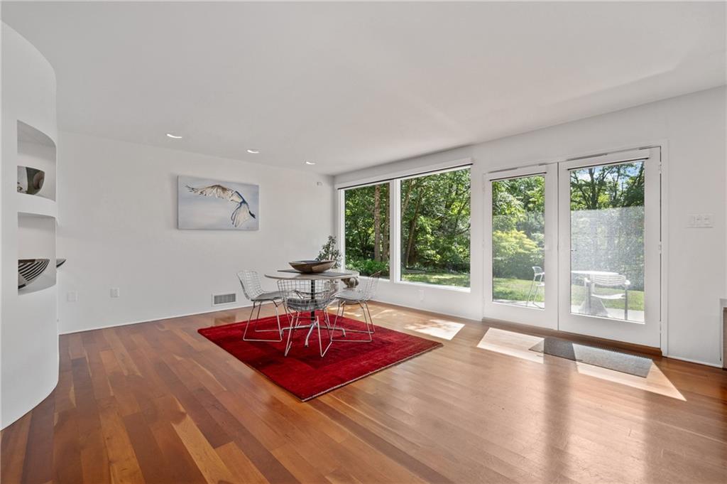 121 Hidden Ridge Pittsburgh, PA 15238 - Photo 11 of 48 a living room with a table window and wooden floor