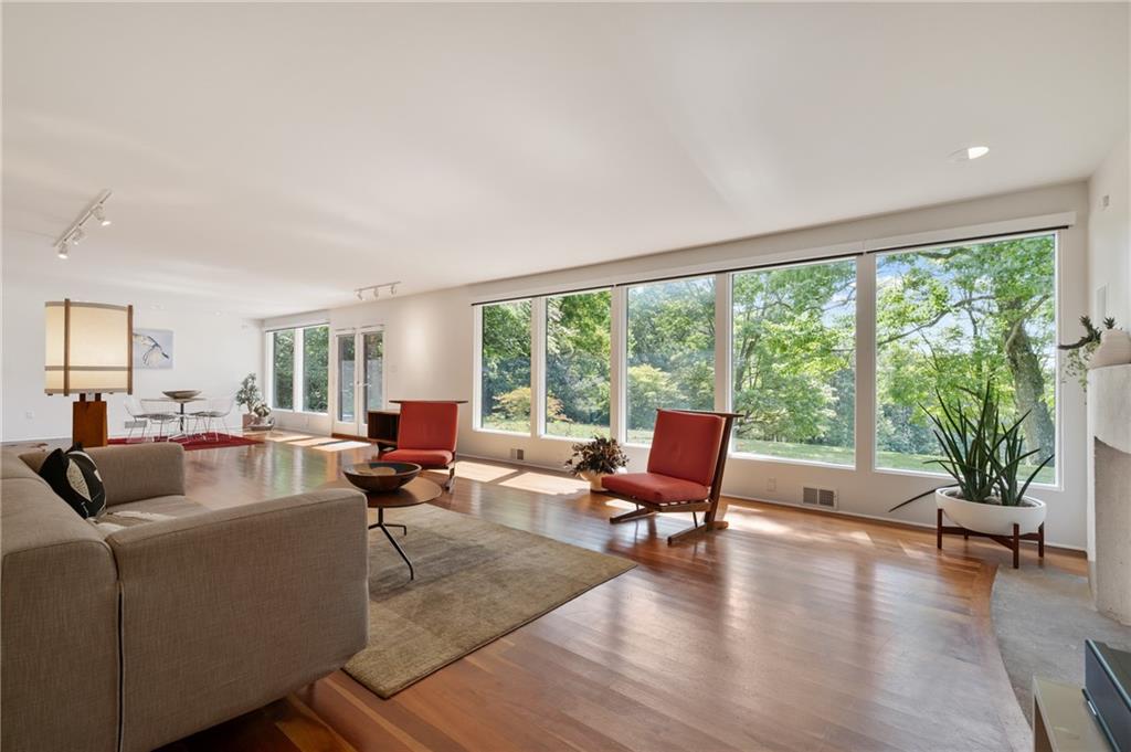 121 Hidden Ridge Pittsburgh, PA 15238 - Photo 12 of 48 a living room with furniture and floor to ceiling windows