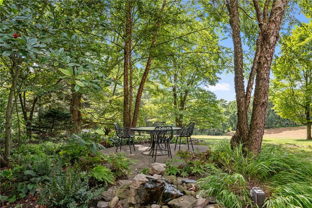 121 Hidden Ridge Pittsburgh, PA 15238 - Photo 21 of 48 a swing chair and trees in the forest