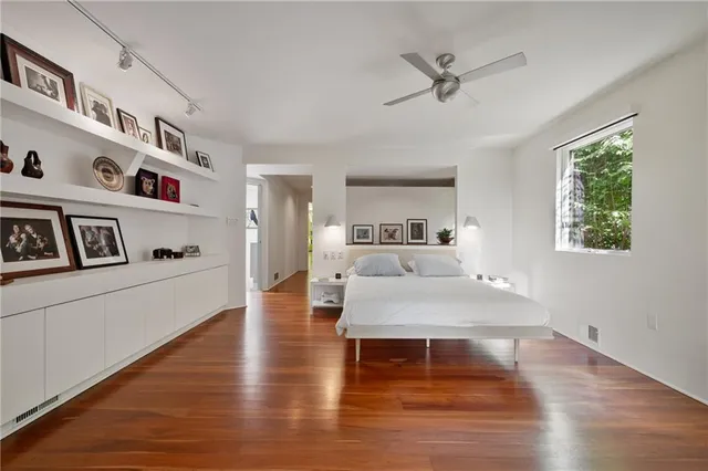 a living room with kitchen island furniture and a table
