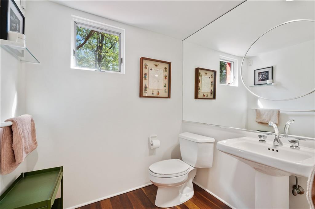 121 Hidden Ridge Pittsburgh, PA 15238 - Photo 28 of 48 a bathroom with a toilet a sink and mirror