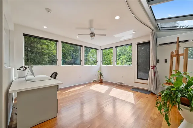 a swimming pool with some trees in the background