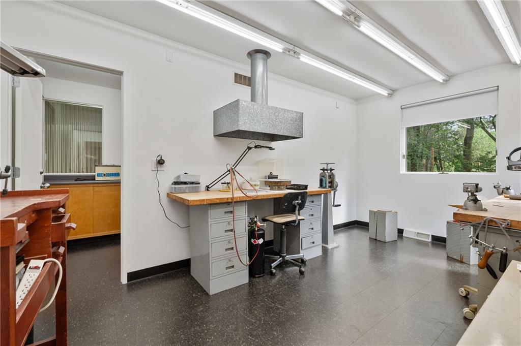 121 Hidden Ridge Pittsburgh, PA 15238 - Photo 34 of 48 a view of a workspace with furniture and a window