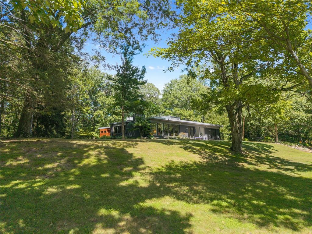 121 Hidden Ridge Pittsburgh, PA 15238 - Photo 41 of 48 a swimming pool with some trees in the background