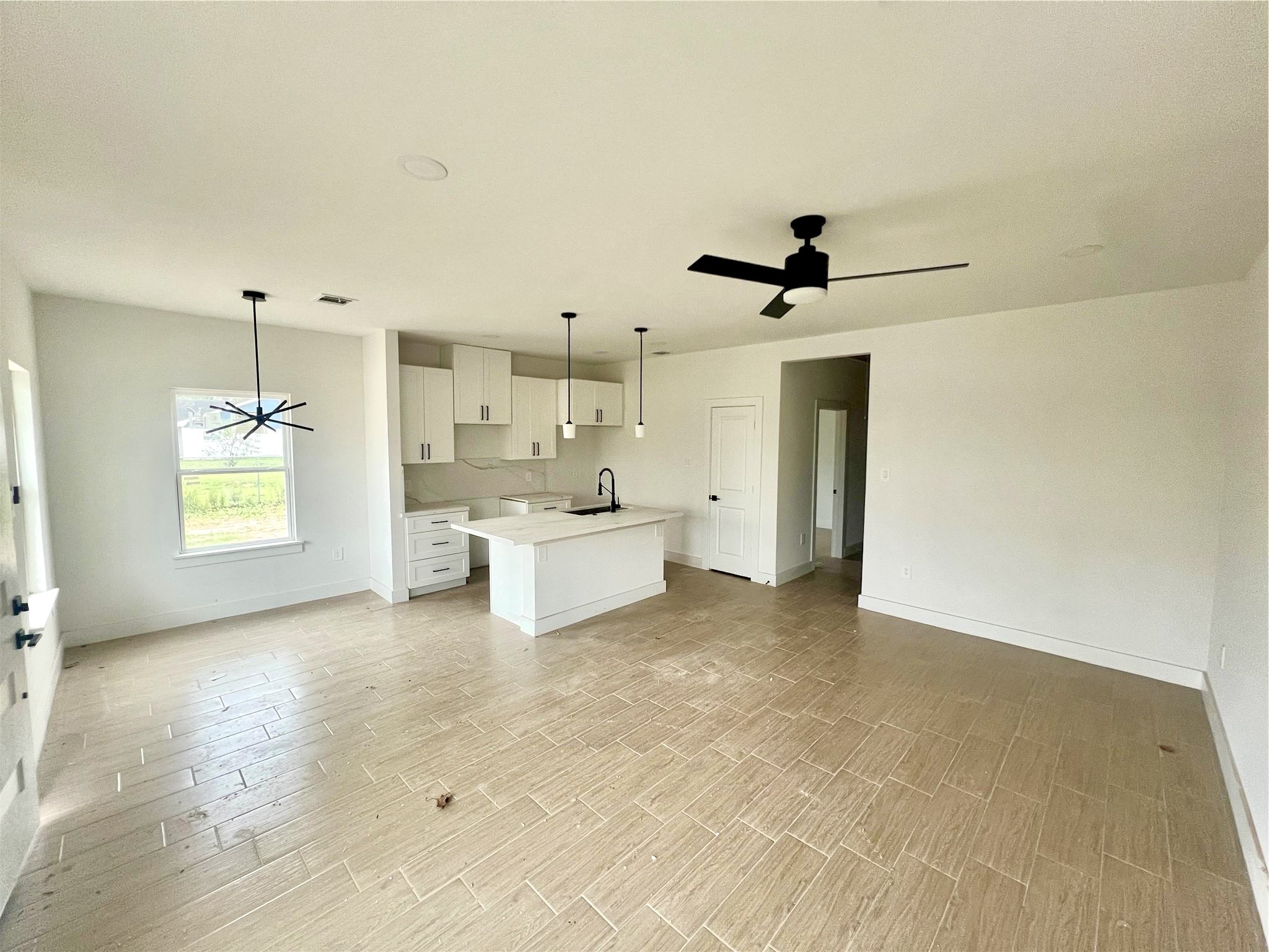 5710 Delmack Street, Unit B Houston, TX 77032 - Photo 8 of 30 Living Room, Dining, & Kitchen
