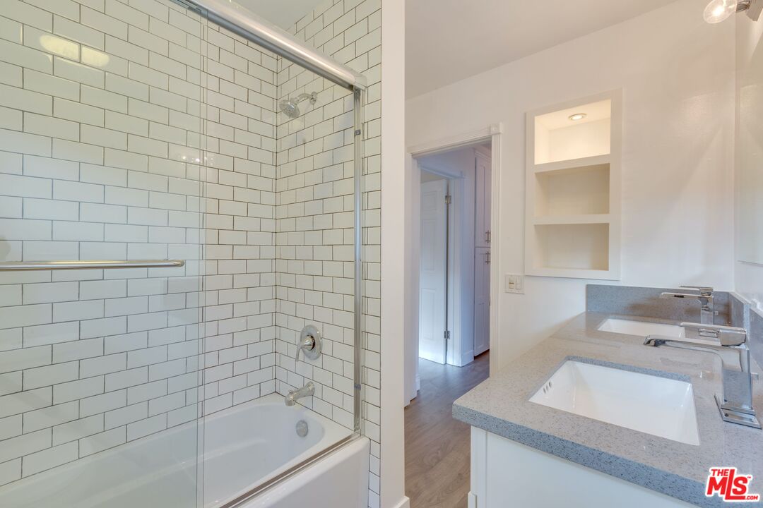 4179 Ince Boulevard, Unit 1/2 Culver City, CA 90232 - Photo 13 of 15 a bathroom with a sink a toilet and shower