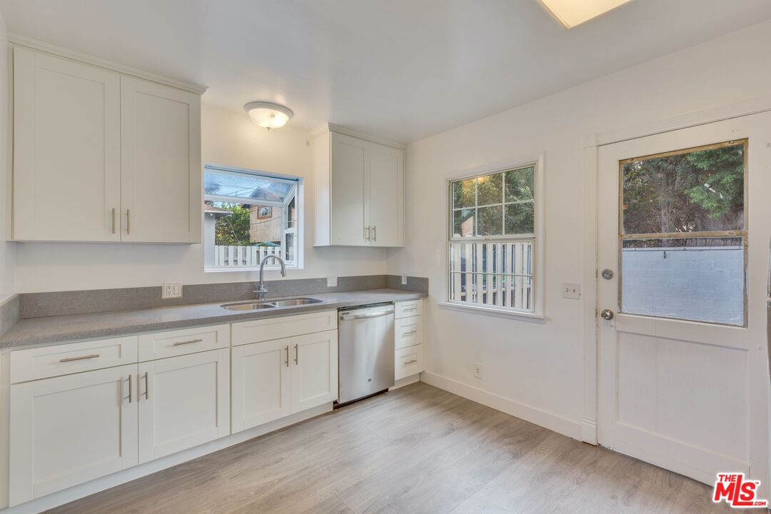 4179 Ince Boulevard, Unit 1/2 Culver City, CA 90232 - Photo 8 of 15 a kitchen with sink and cabinets