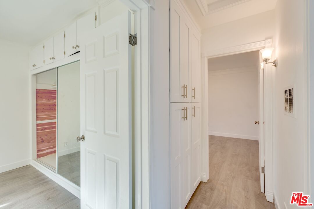 4179 Ince Boulevard, Unit 1/2 Culver City, CA 90232 - Photo 9 of 15 a view of a hallway with wooden floor