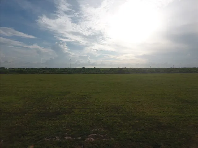 a view of an ocean with beach