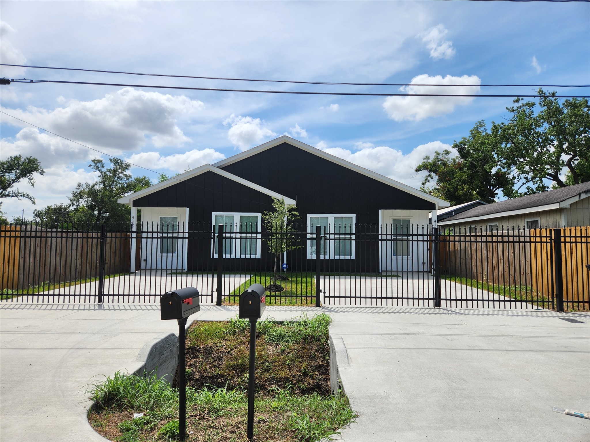 a house view with a garden space