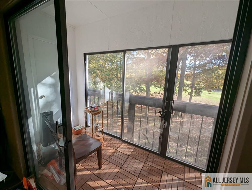 277 Cross Drive, Unit 2E Monroe Township, NJ 08831 - Photo 4 of 10 a view of front door door and porch