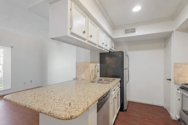 a view of kitchen and utility room