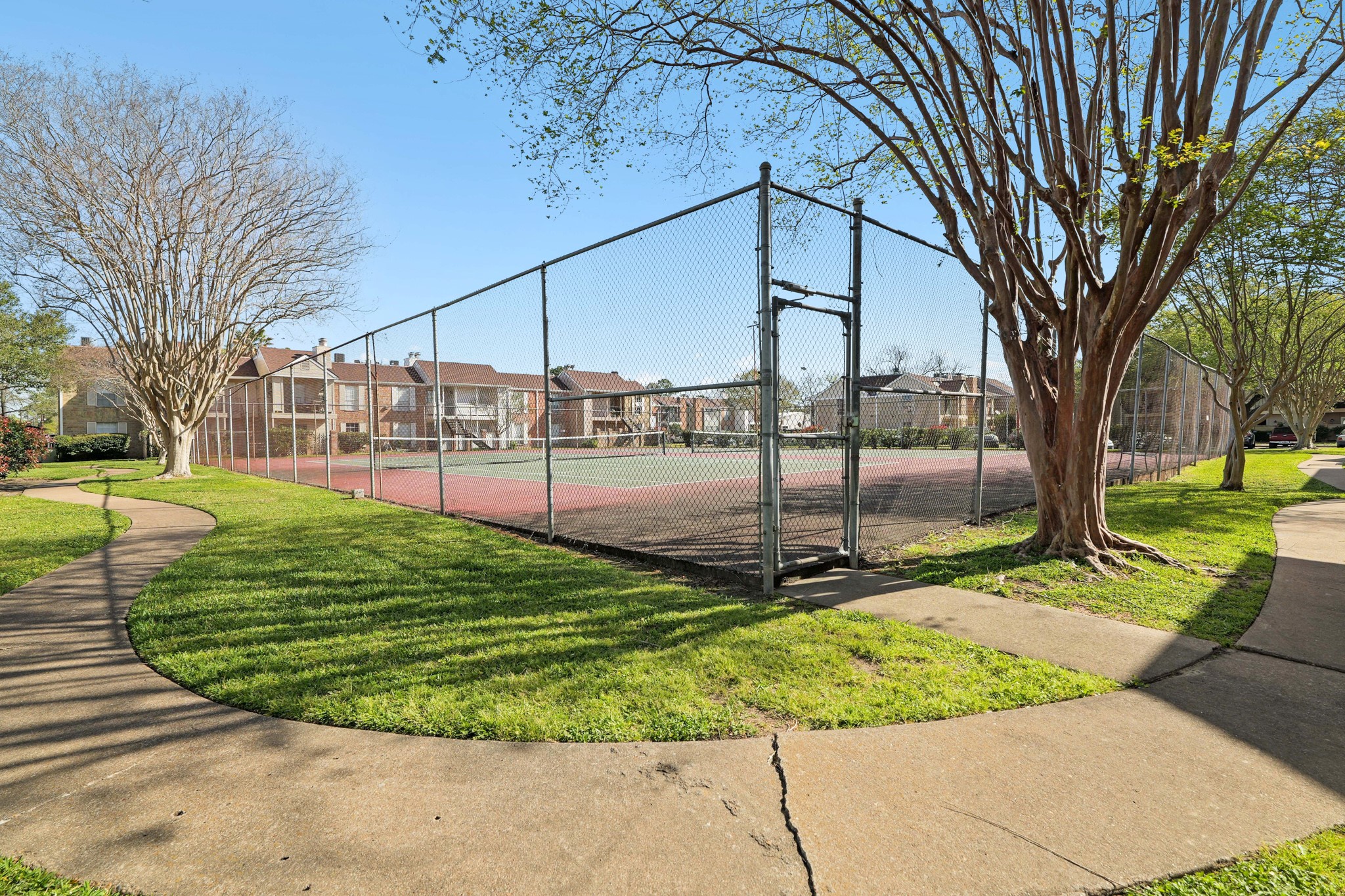 2800 Jeanetta Street, Unit 1402 Houston, TX 77063 - Photo 23 of 29 a view of a backyard with a garden