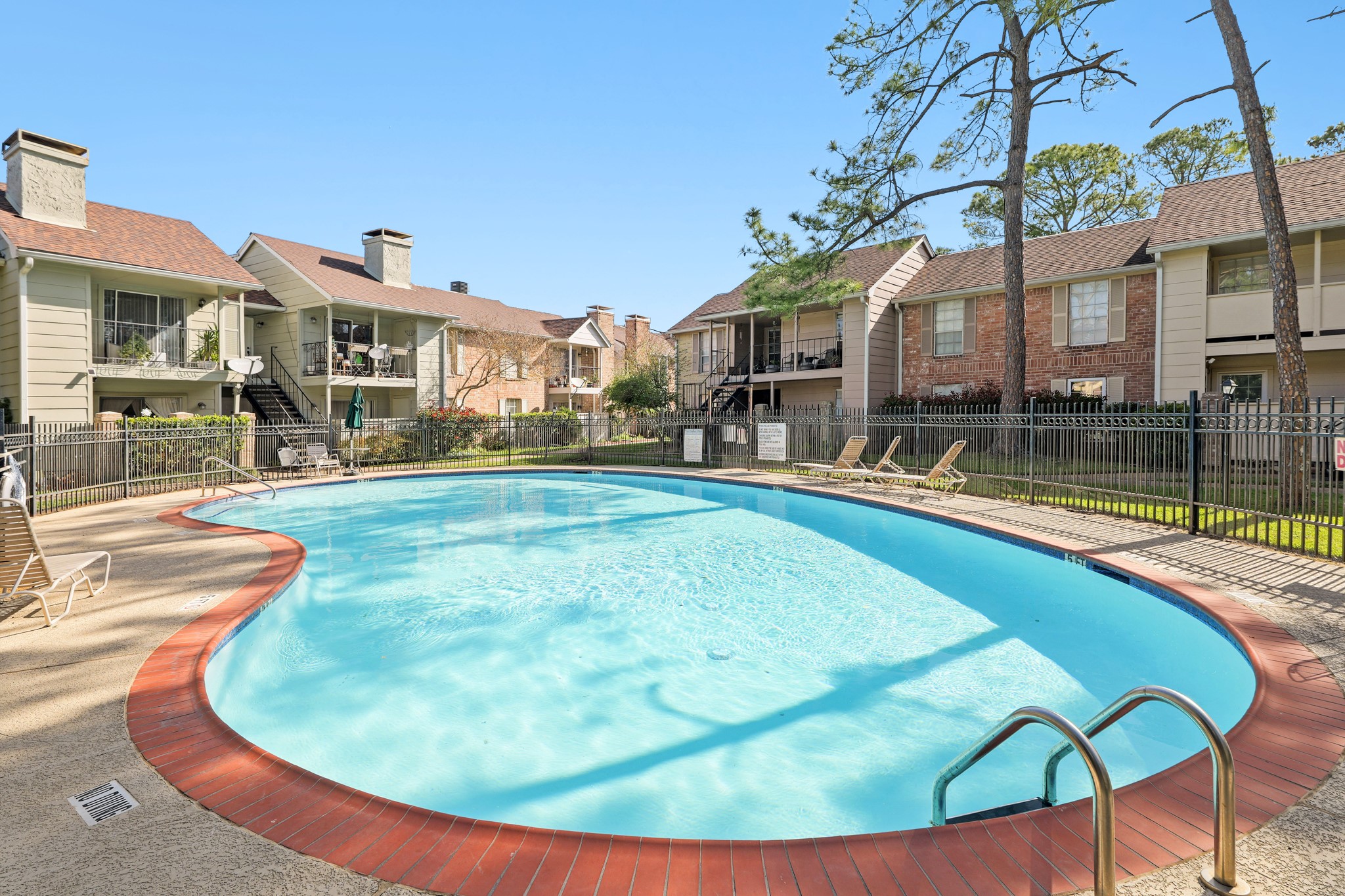 2800 Jeanetta Street, Unit 1402 Houston, TX 77063 - Photo 25 of 29 a view of a house with swimming pool